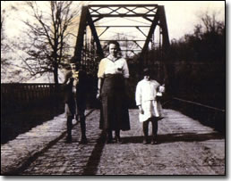 Alice Phelps, Conner Phelps and Lettie Phelps at the Triplett Creek bridge